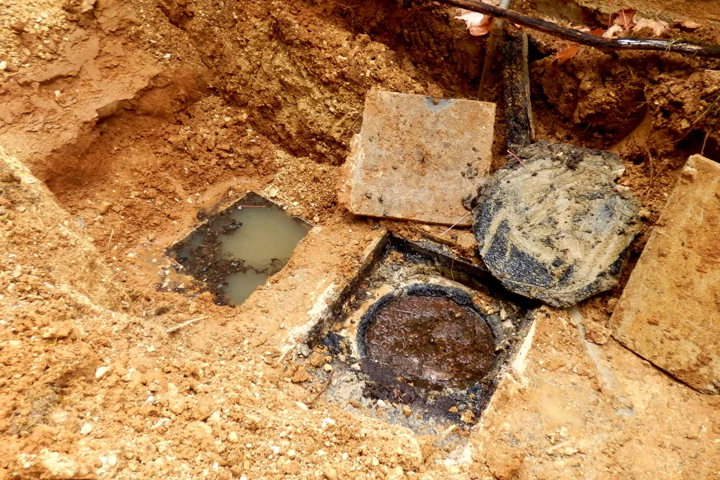 Septic tank hatches opened for an inspection